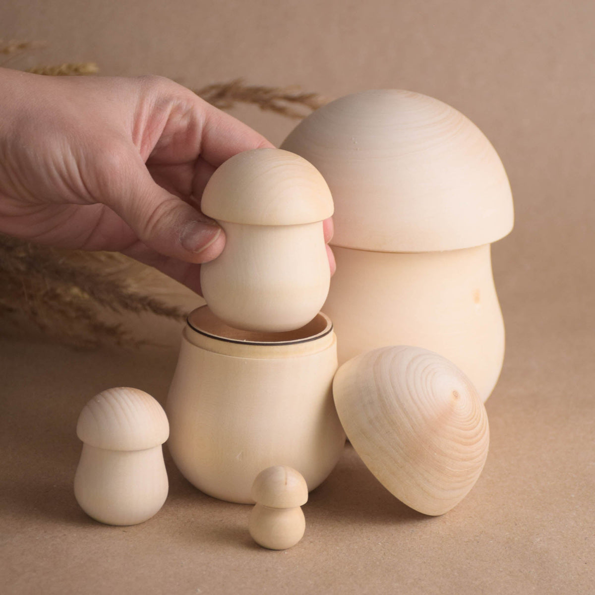 Natural wooden mushroom nesting figures