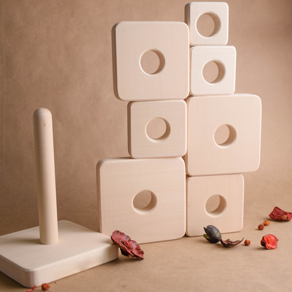 Natural wood stacking rings toy with square rings