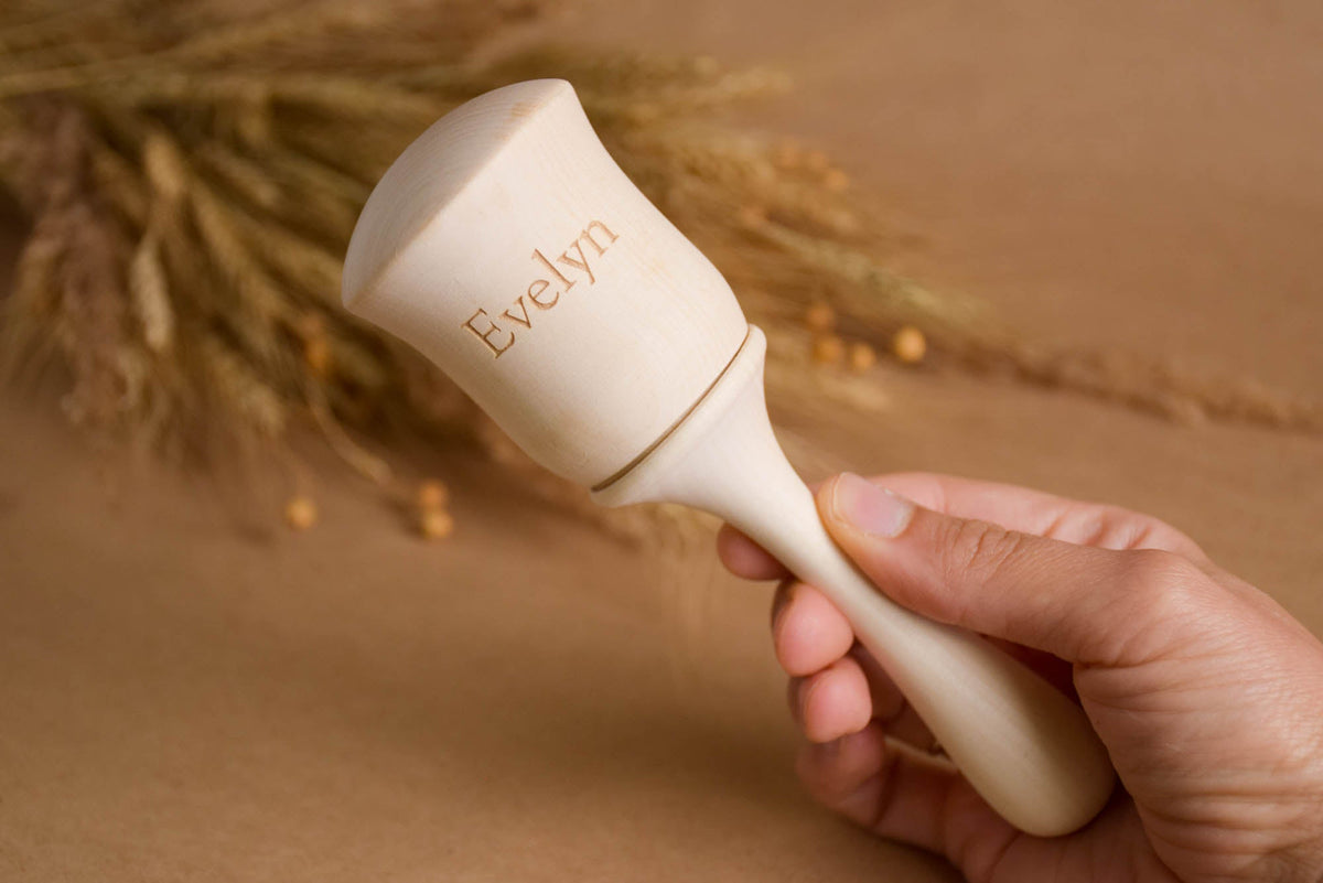 Wooden baby maraca from the Bell collection