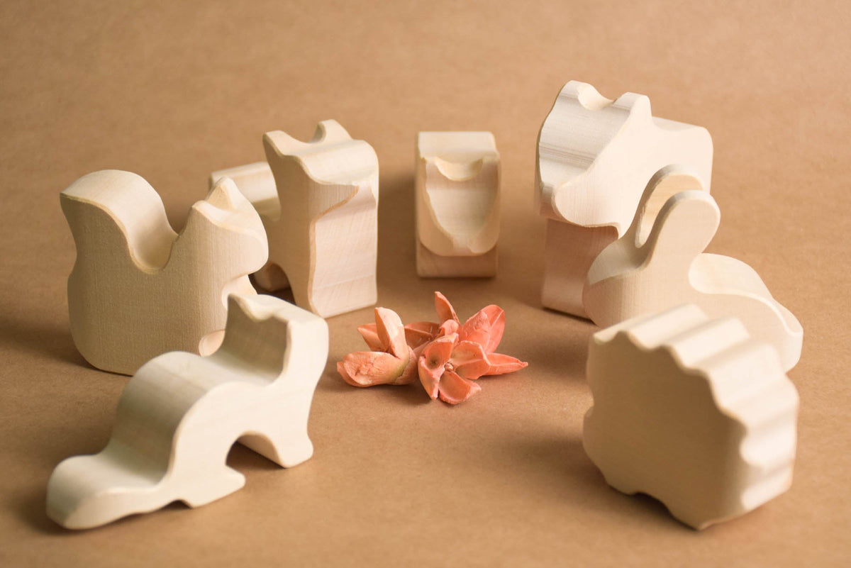 Natural wood animal figures for imaginative play