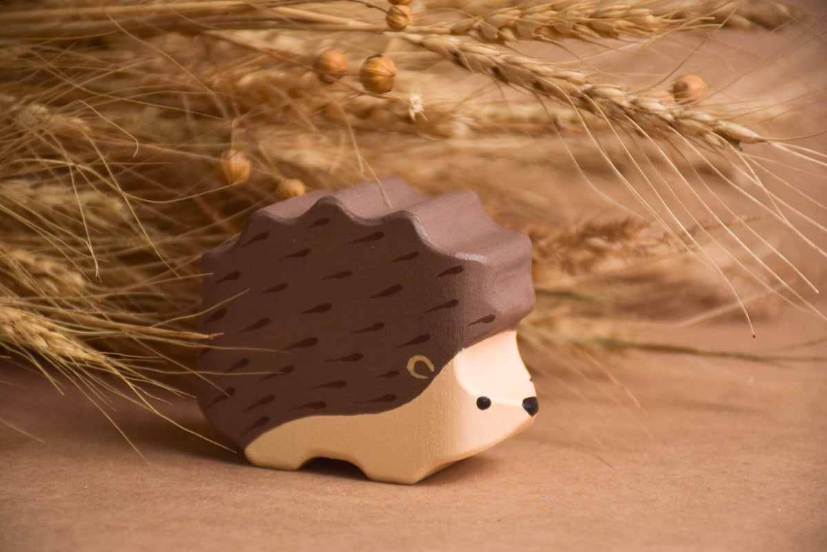 Handmade painted animal figures for imaginative play