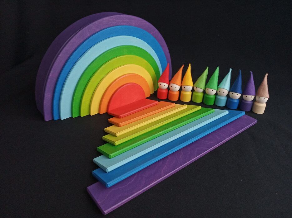 Handmade Montessori rainbow building toy in linden wood and plywood with a natural wax-and-oil finish