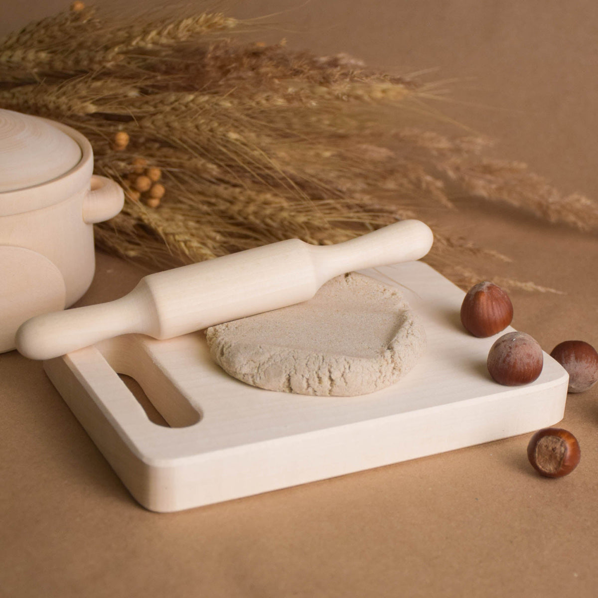 Handmade natural wooden play dishes for Montessori-inspired play, crafted from solid wood