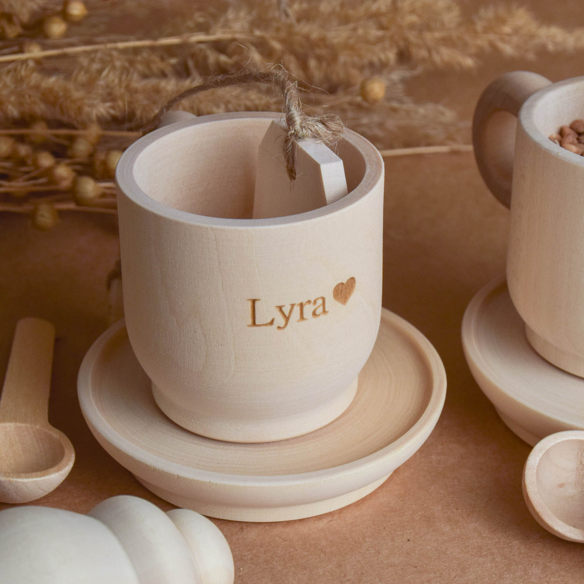 Handmade wooden tea party accessories for Montessori-inspired play, crafted from natural solid wood