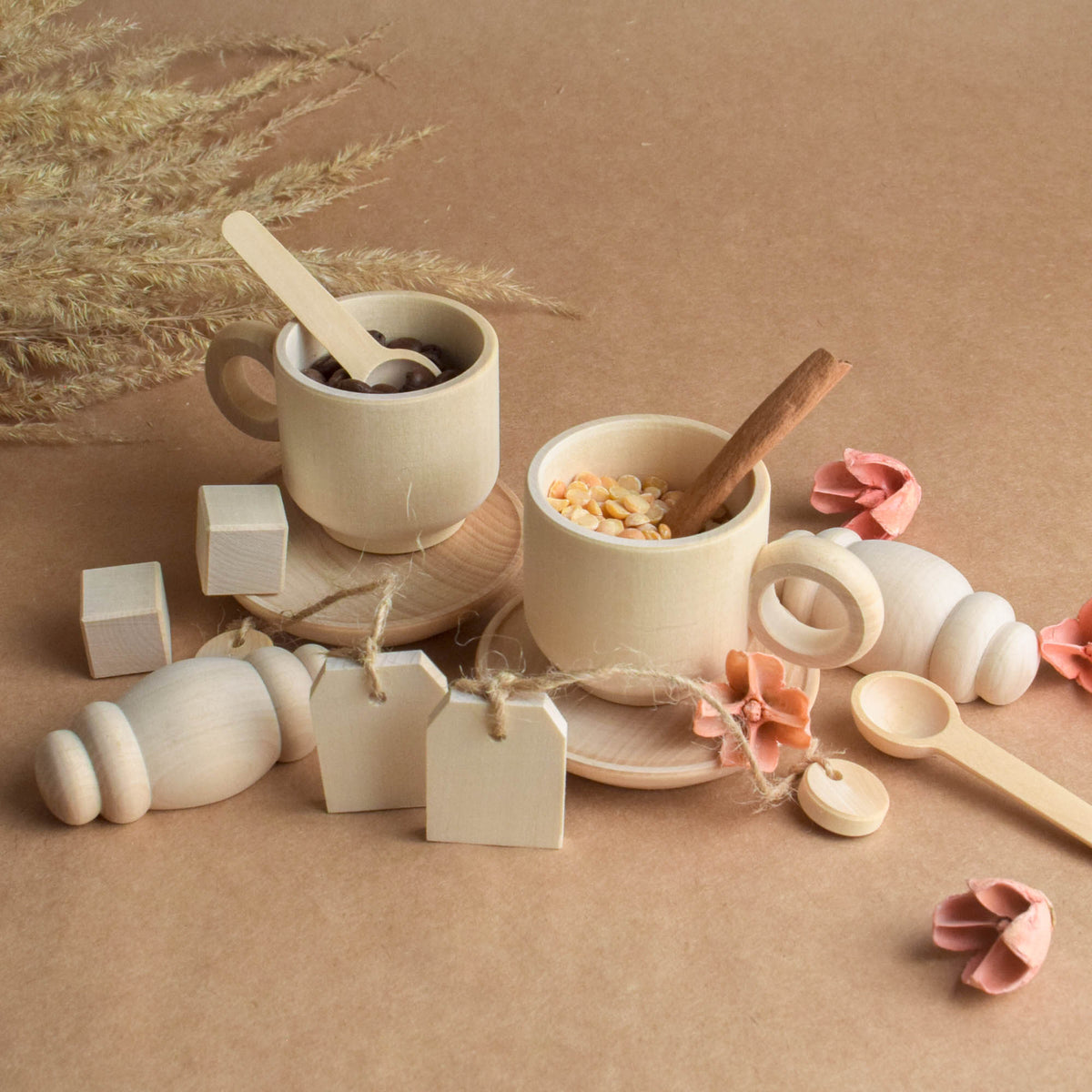 Handmade wooden tea party accessories for Montessori-inspired play, crafted from natural solid wood