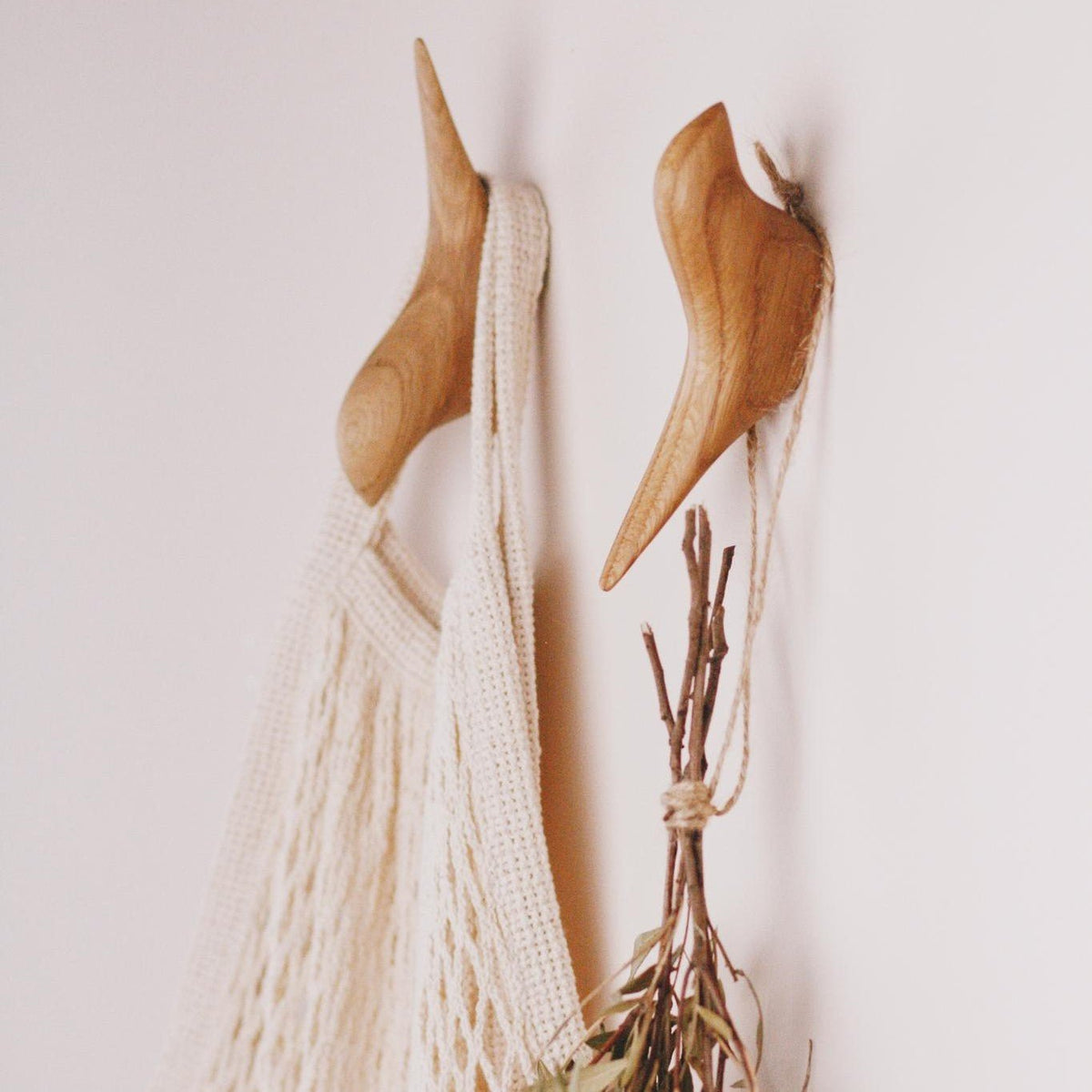 Bird-shaped wall hooks made from solid oak