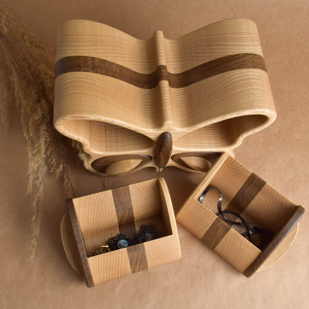 Handmade wooden jewelry box in the shape of a butterfly