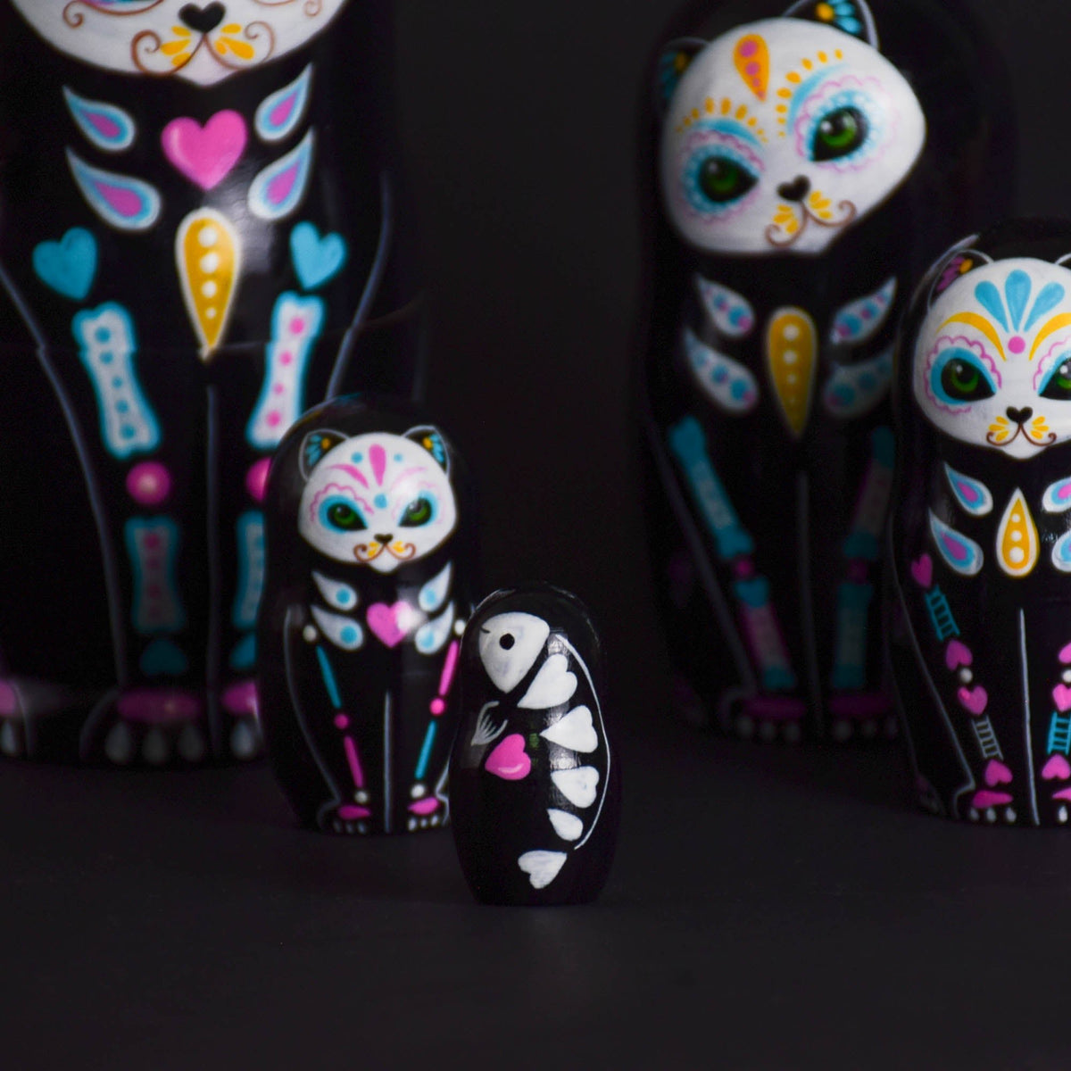Calavera cat-shaped nesting dolls made from solid wood
