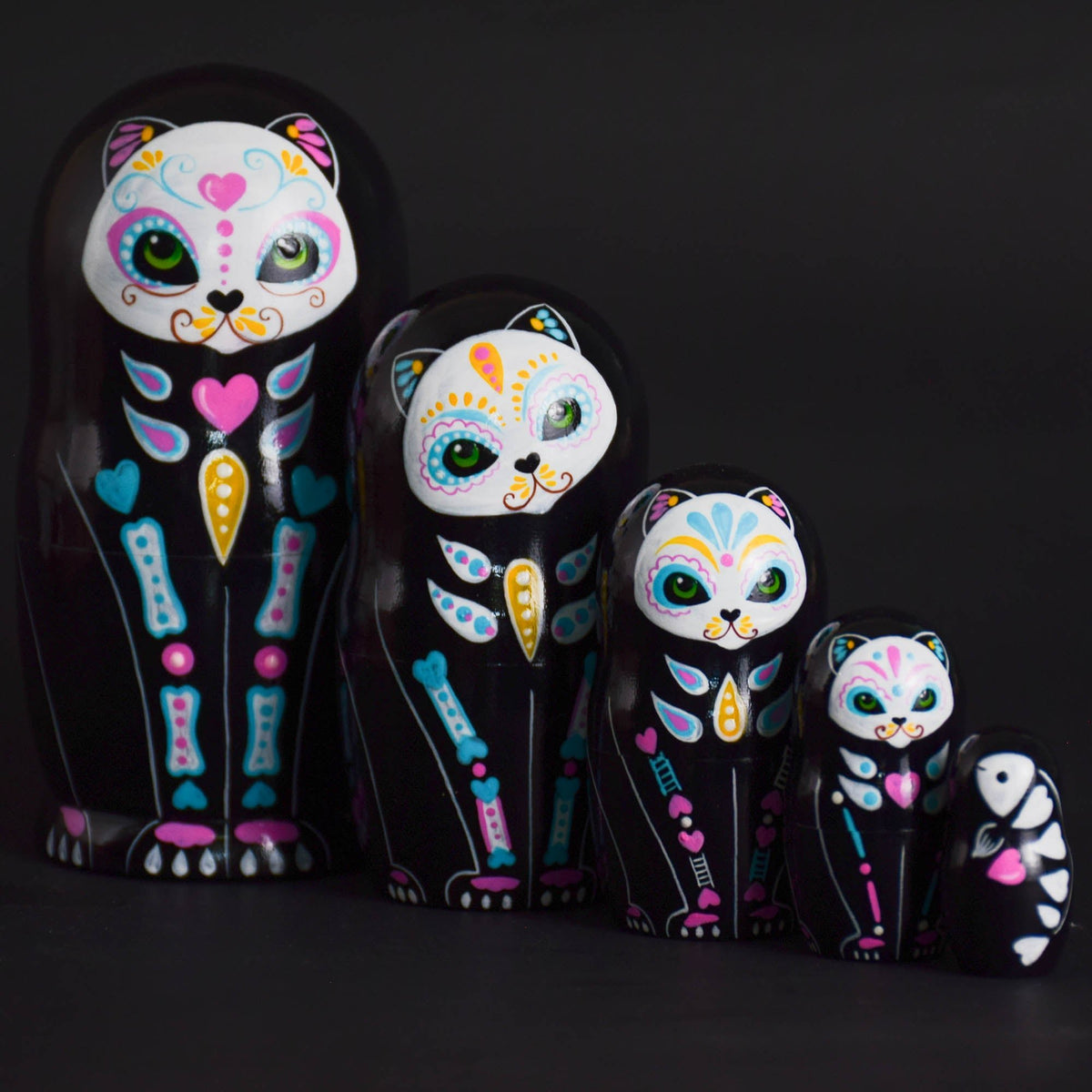 Hand-painted cat matryoshka dolls in graduated sizes
