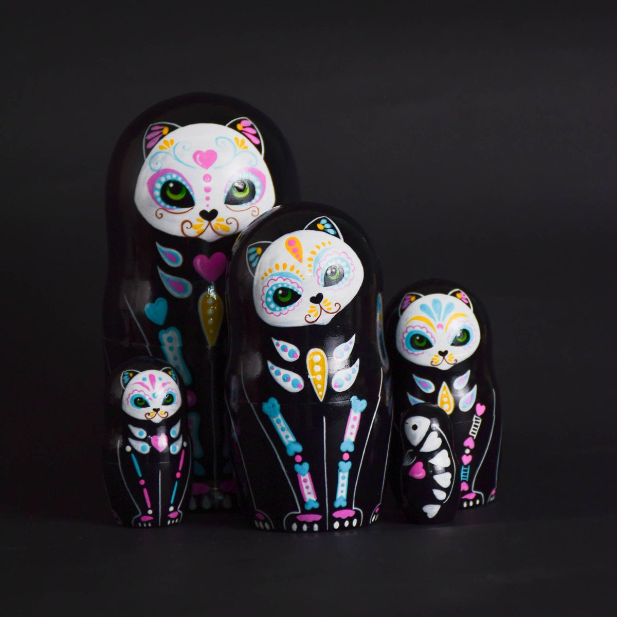 Hand-painted wooden Calavera cat nesting dolls