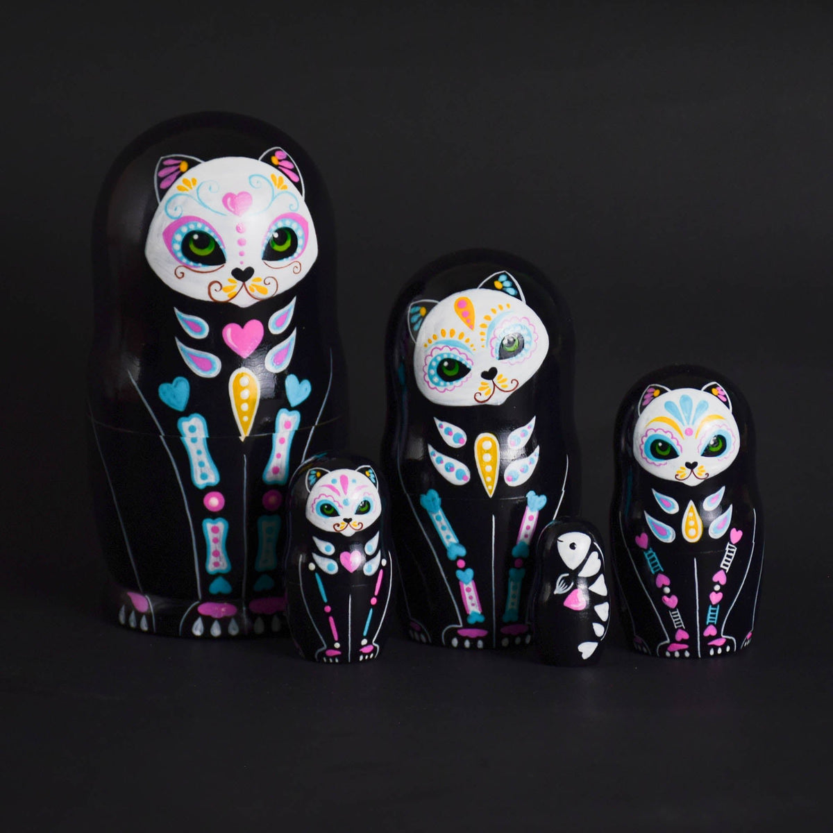 Colorful cat-shaped wooden matryoshka figures