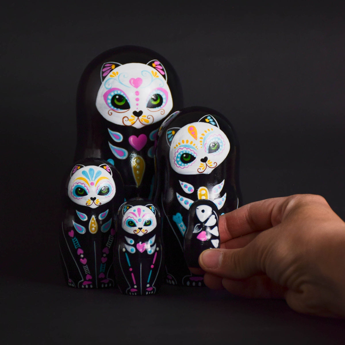 Wooden Calavera cat dolls with decorative painted details