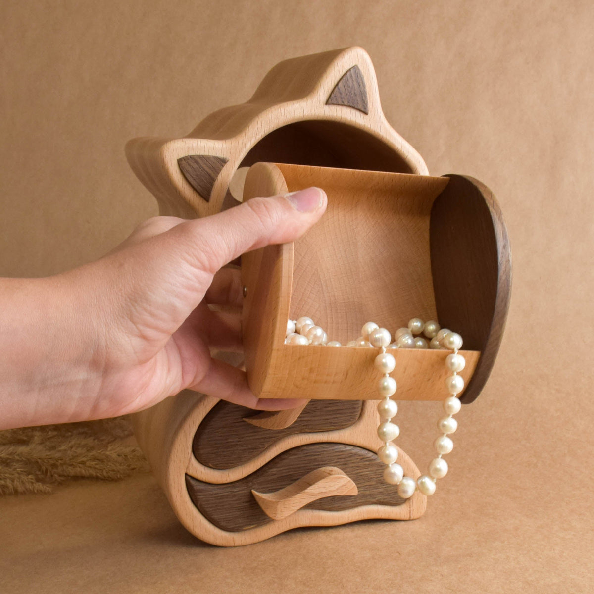 Handmade wooden jewelry box in the shape of a cat