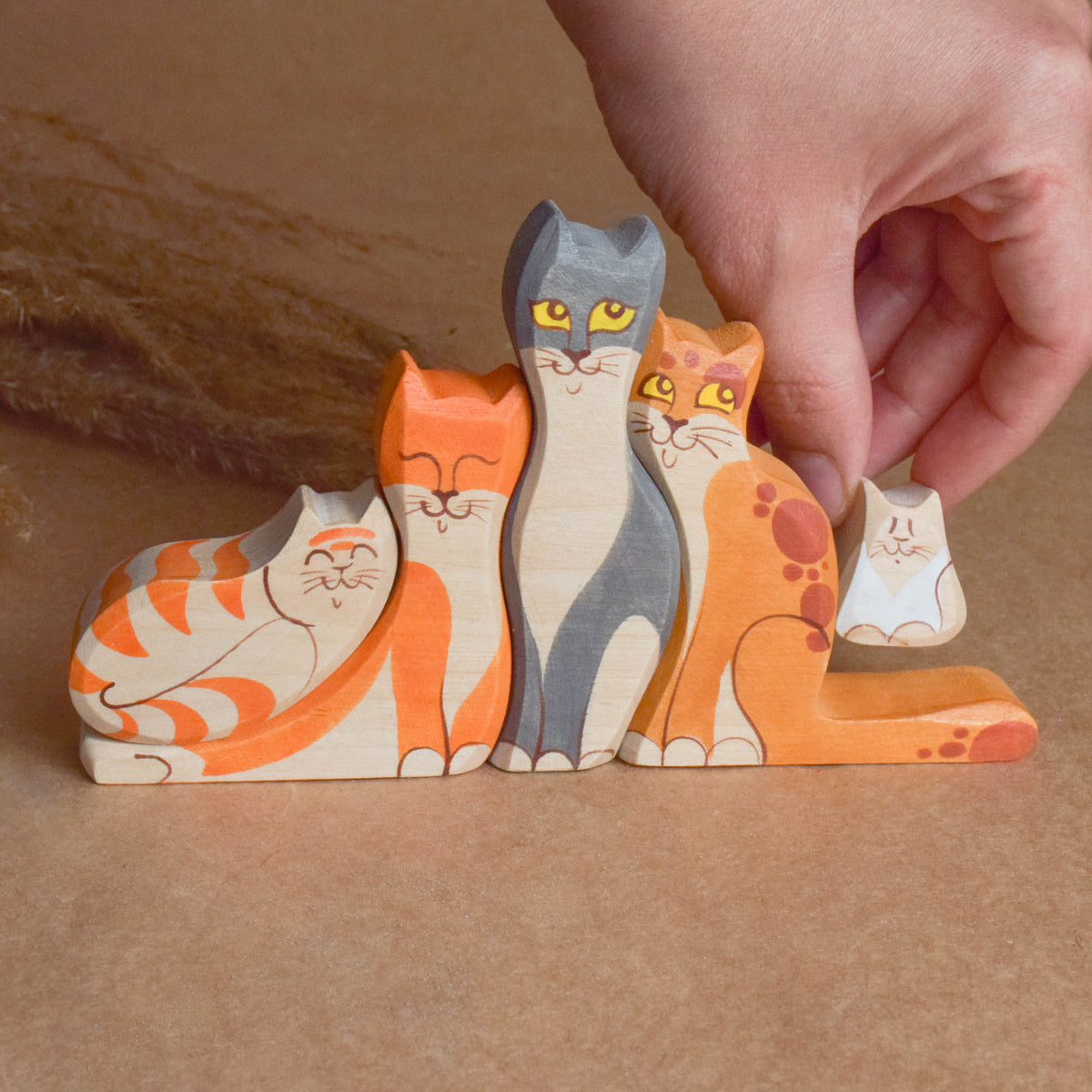 Handcrafted wooden cat family play set