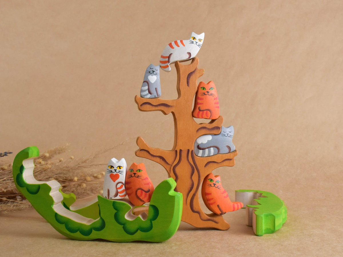 Wooden animal puzzle with cats and a tree