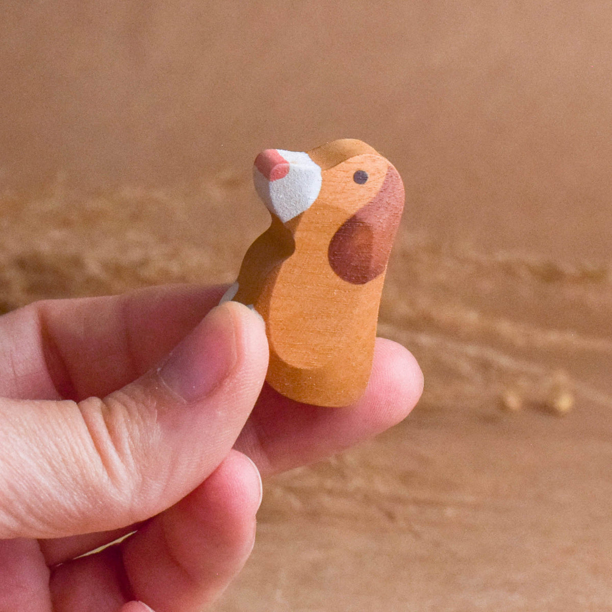 Wooden animal figurines of dogs and puppies