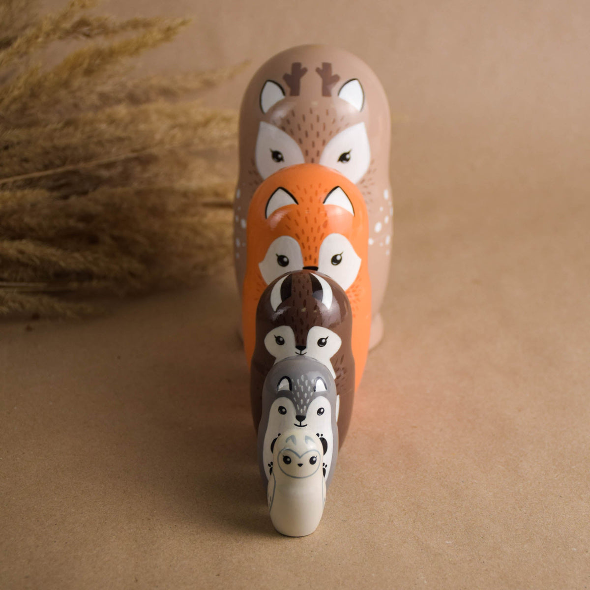 Animal-shaped wooden nesting dolls