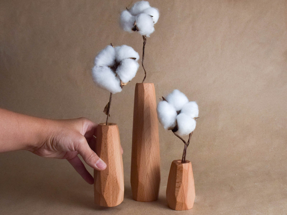 Modern geometric vases made from natural wood