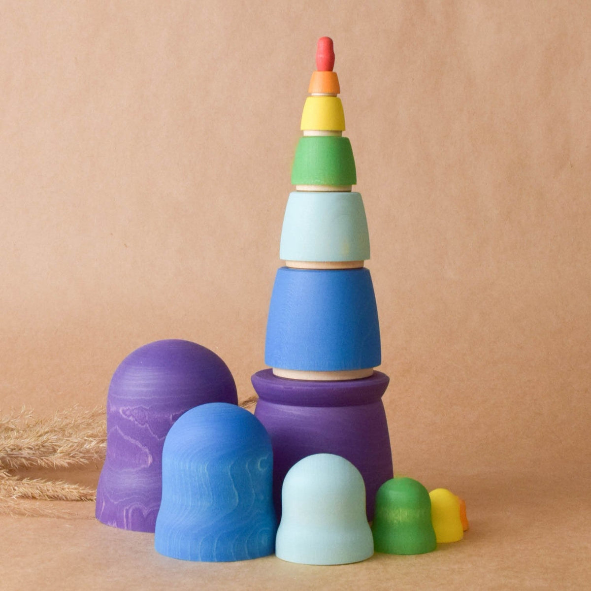 Bright rainbow wooden nesting dolls