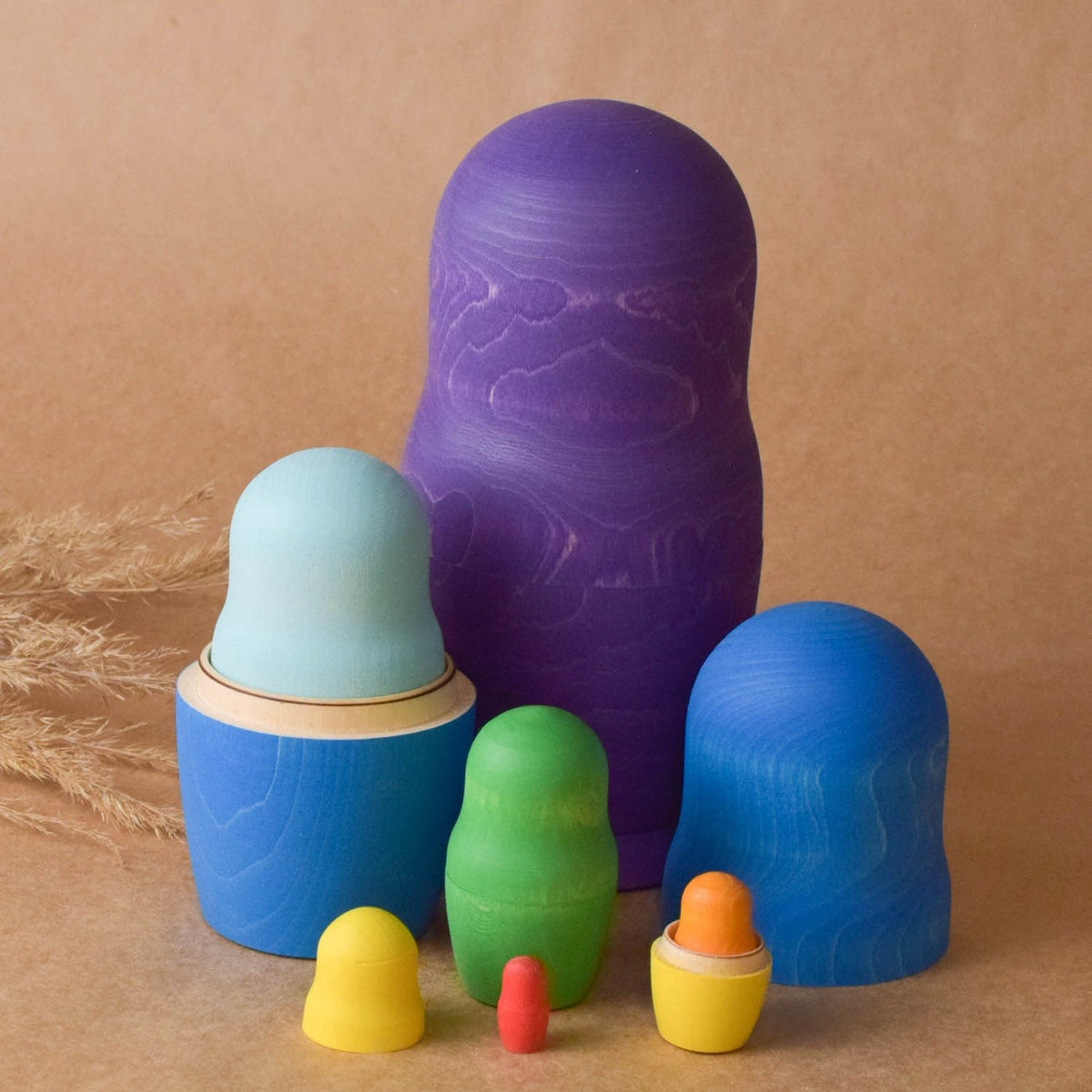 Wooden matryoshka figures in graduated sizes
