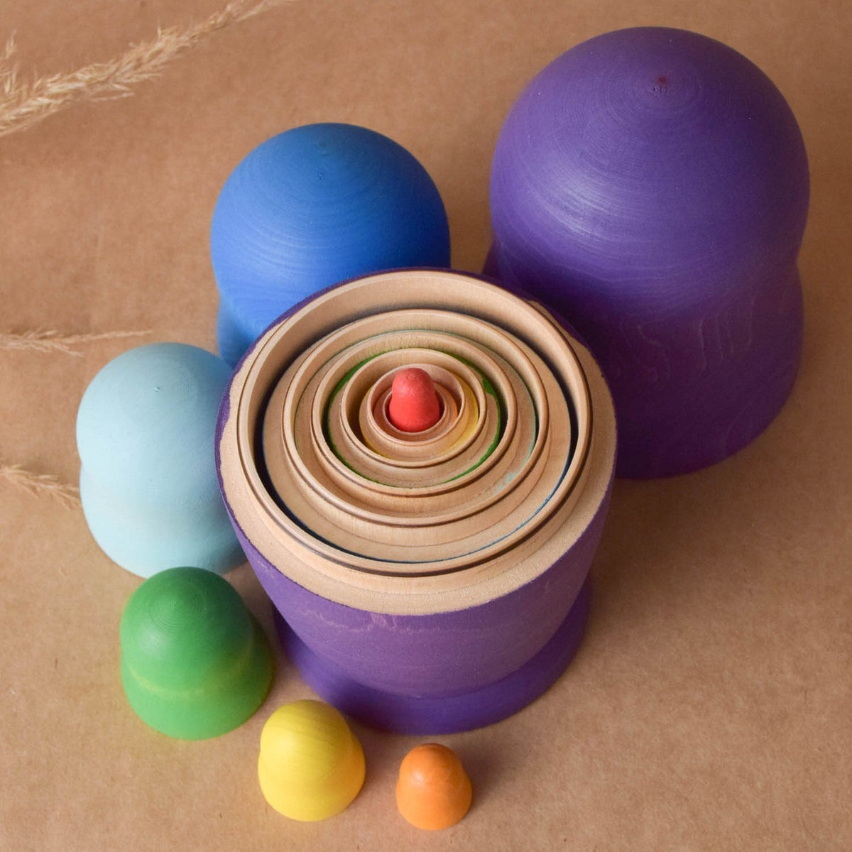Rainbow wooden matryoshka nesting dolls