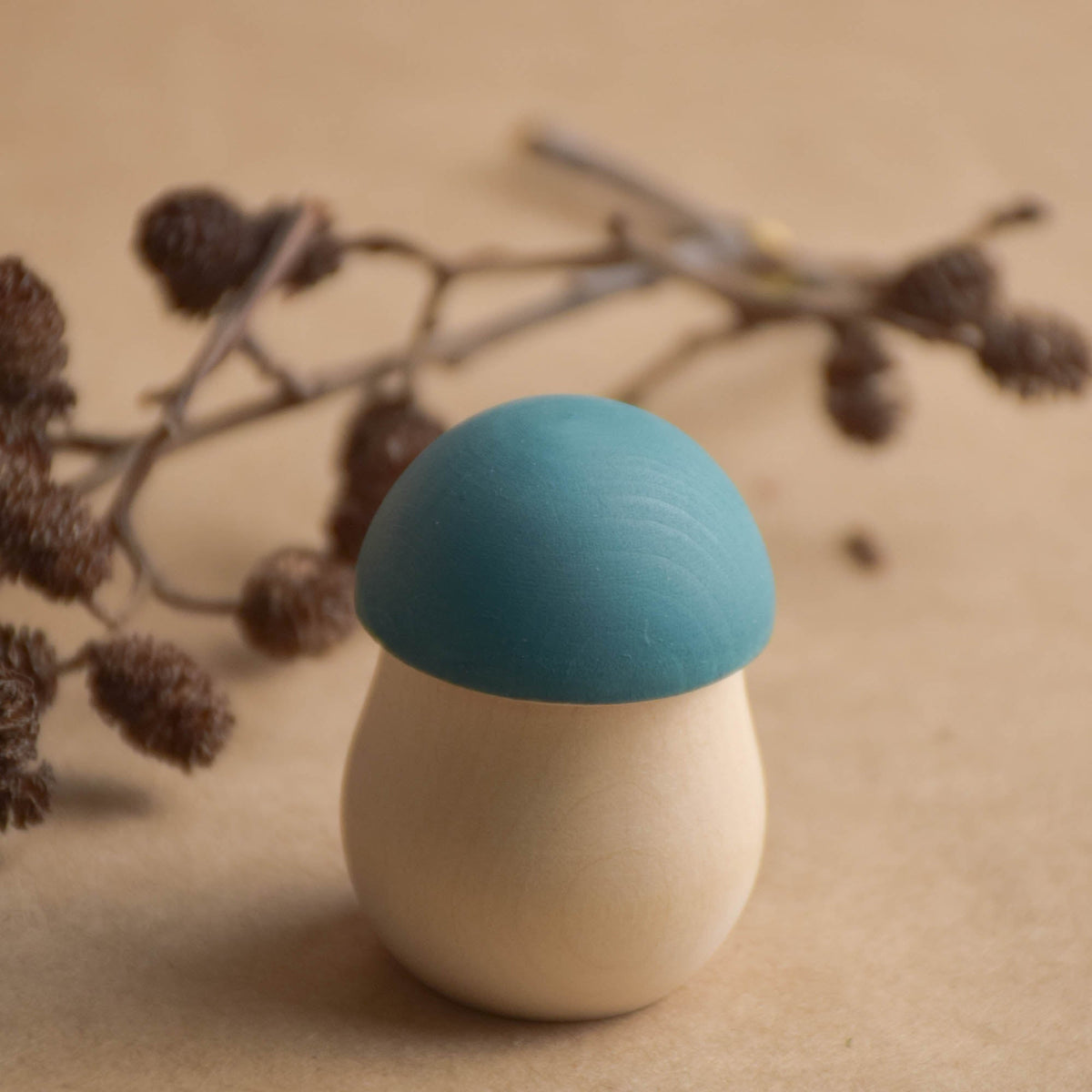 Wooden mushroom-shaped nesting figures