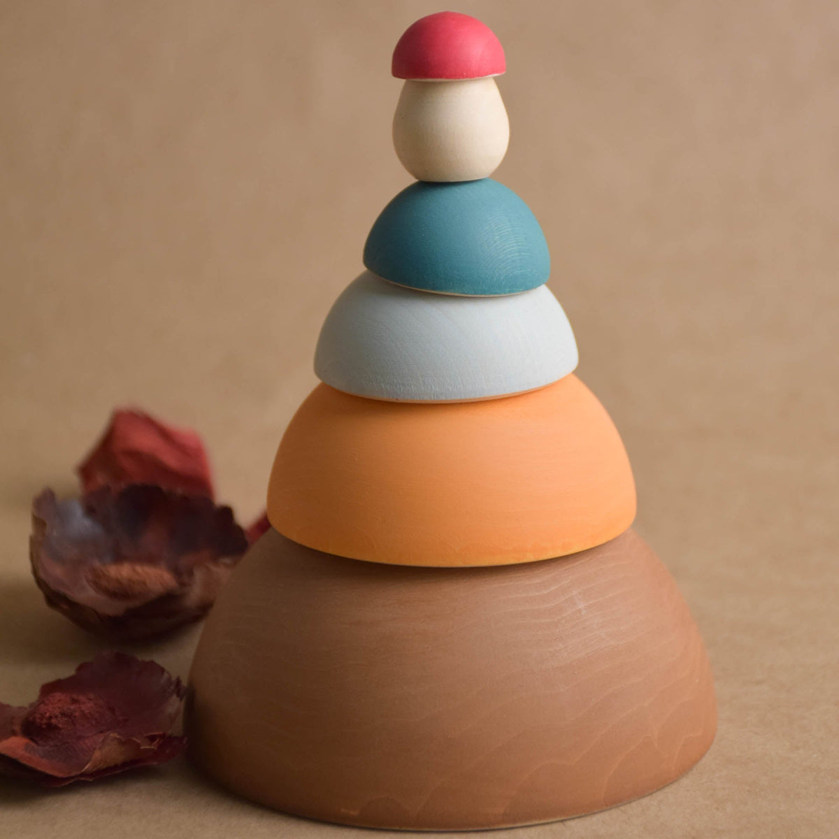 Mushroom-shaped matryoshka dolls in natural wood