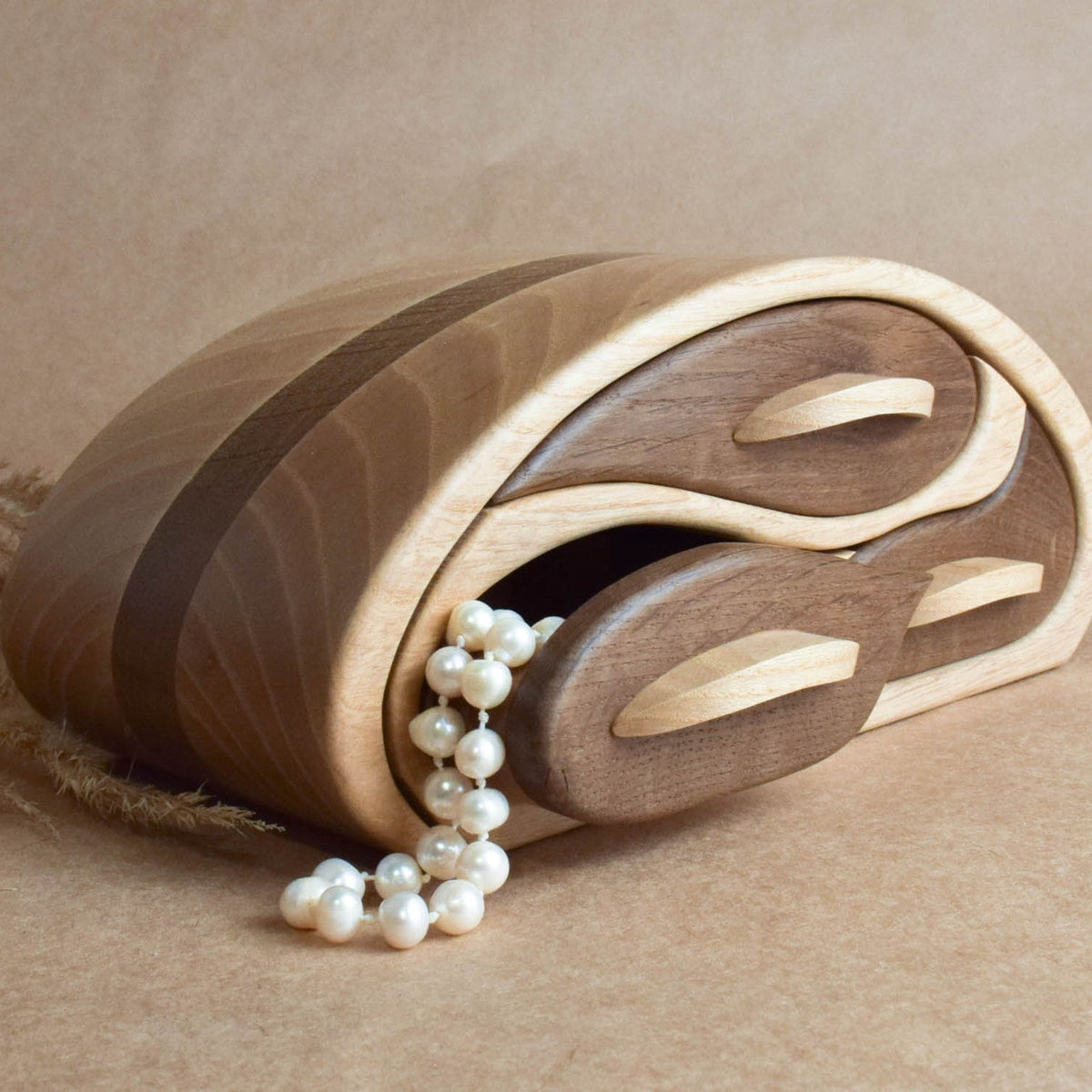 Ash and oak jewelry organizer with an oval design