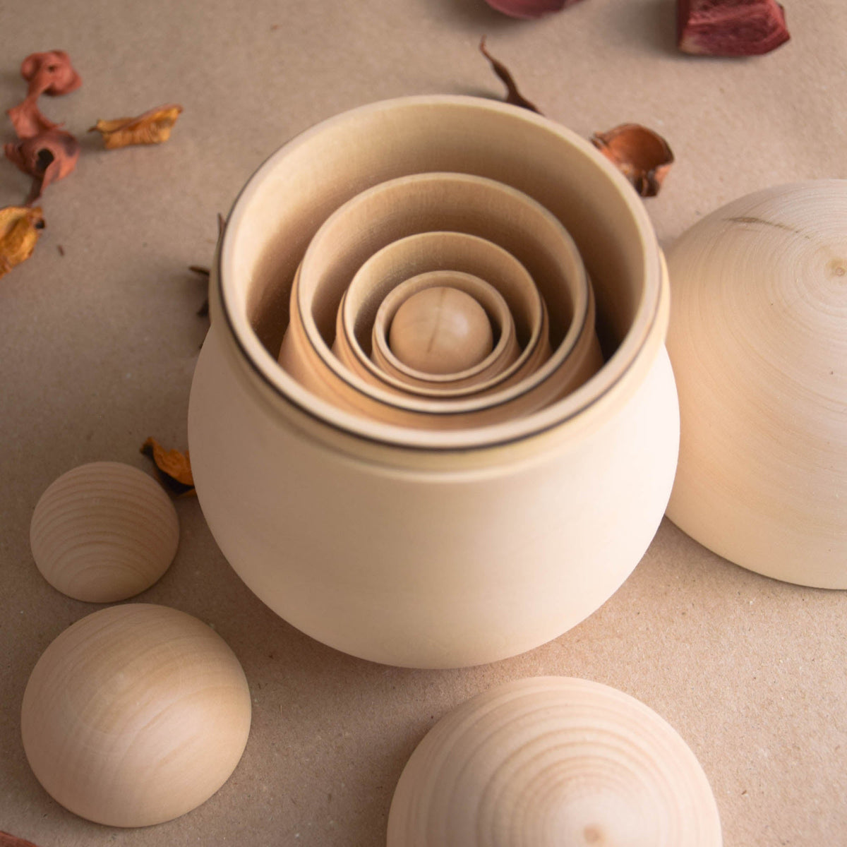 Wooden nesting mushrooms with undecorated surfaces
