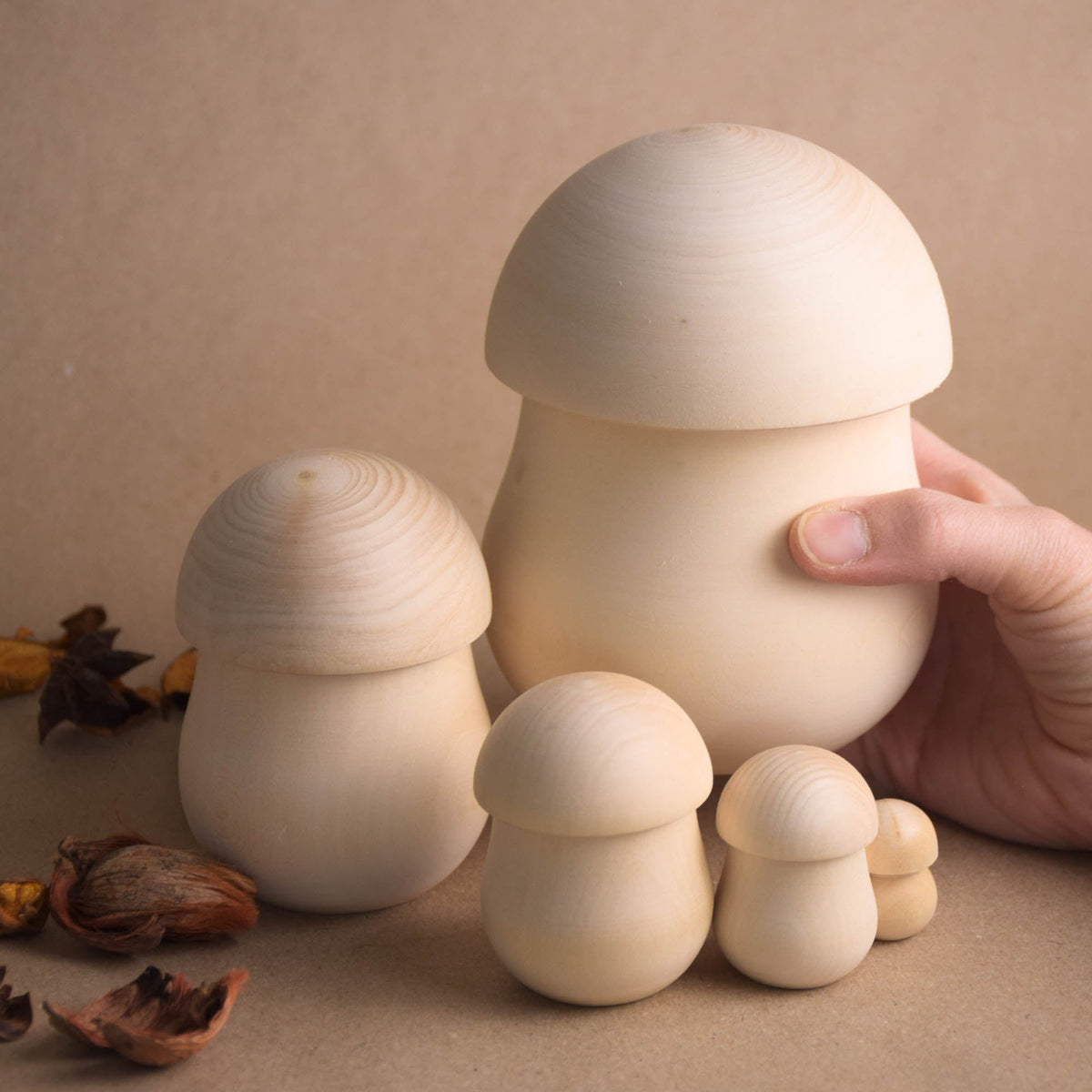 Unpainted wooden mushroom nesting dolls