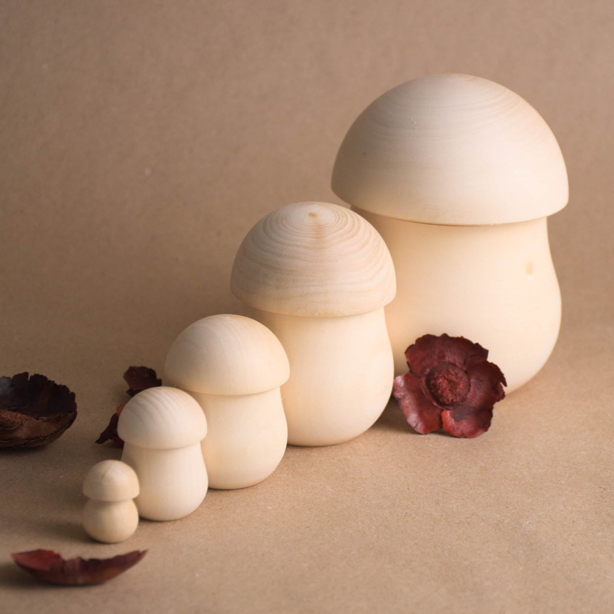 Unpainted mushroom matryoshka dolls in graduated sizes