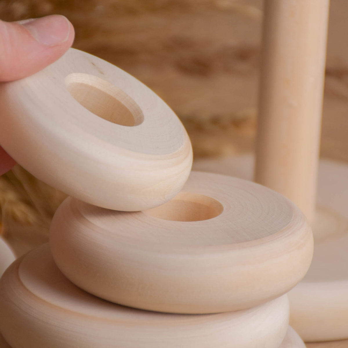 Natural wood stacking rings toy with turned rings