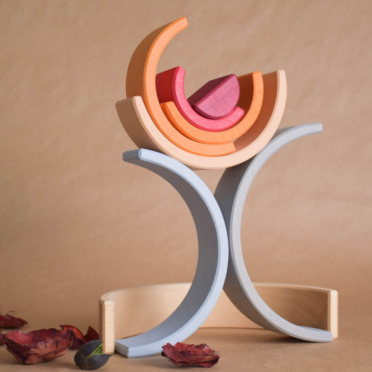 Handmade Montessori neutral rainbow stacker in linden wood with a natural wax-and-oil finish