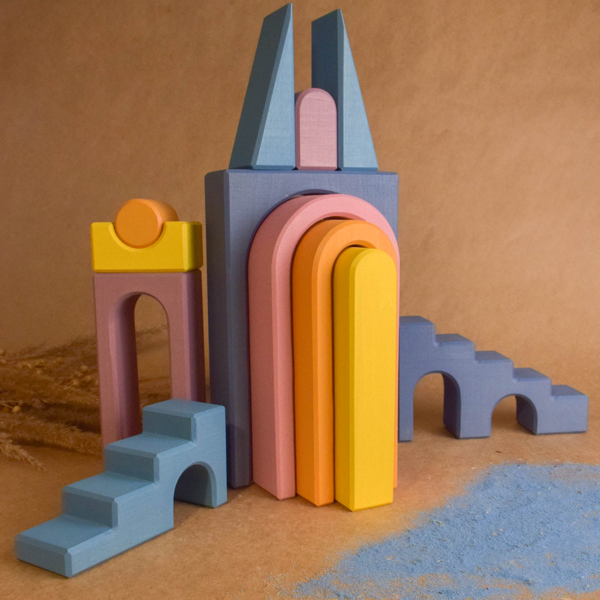 Product photo of Pastel City Building Set, a pastel-colored city-building wooden wooden rainbow stacker set.