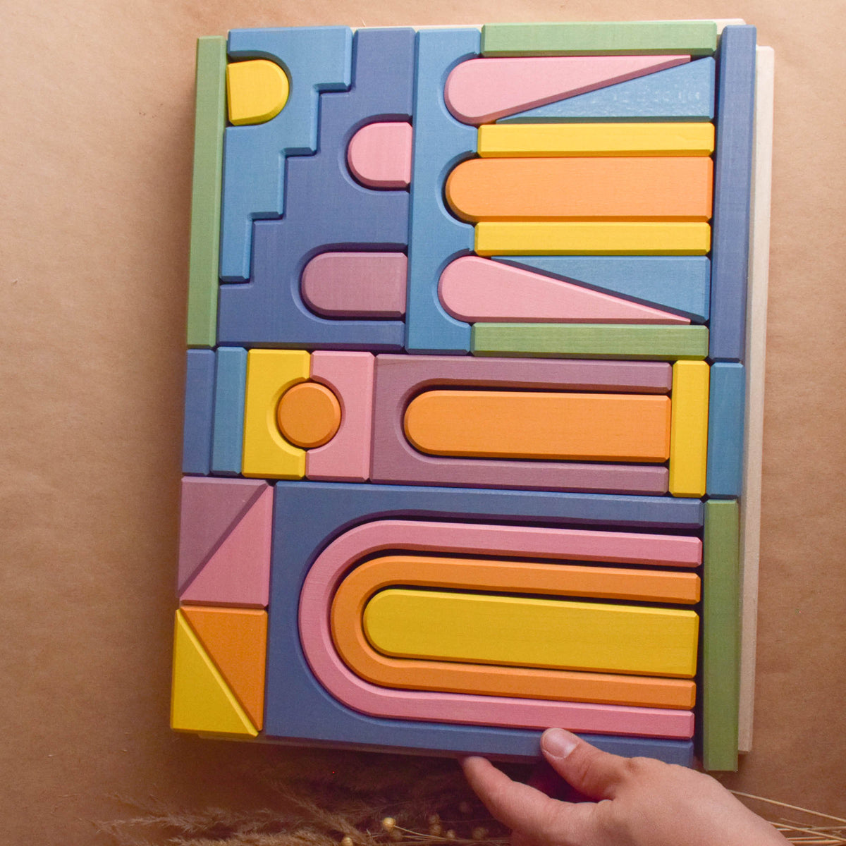 Pastel City Building Set featuring pastel-colored city-building wooden pieces for stacking, arranging, and building.