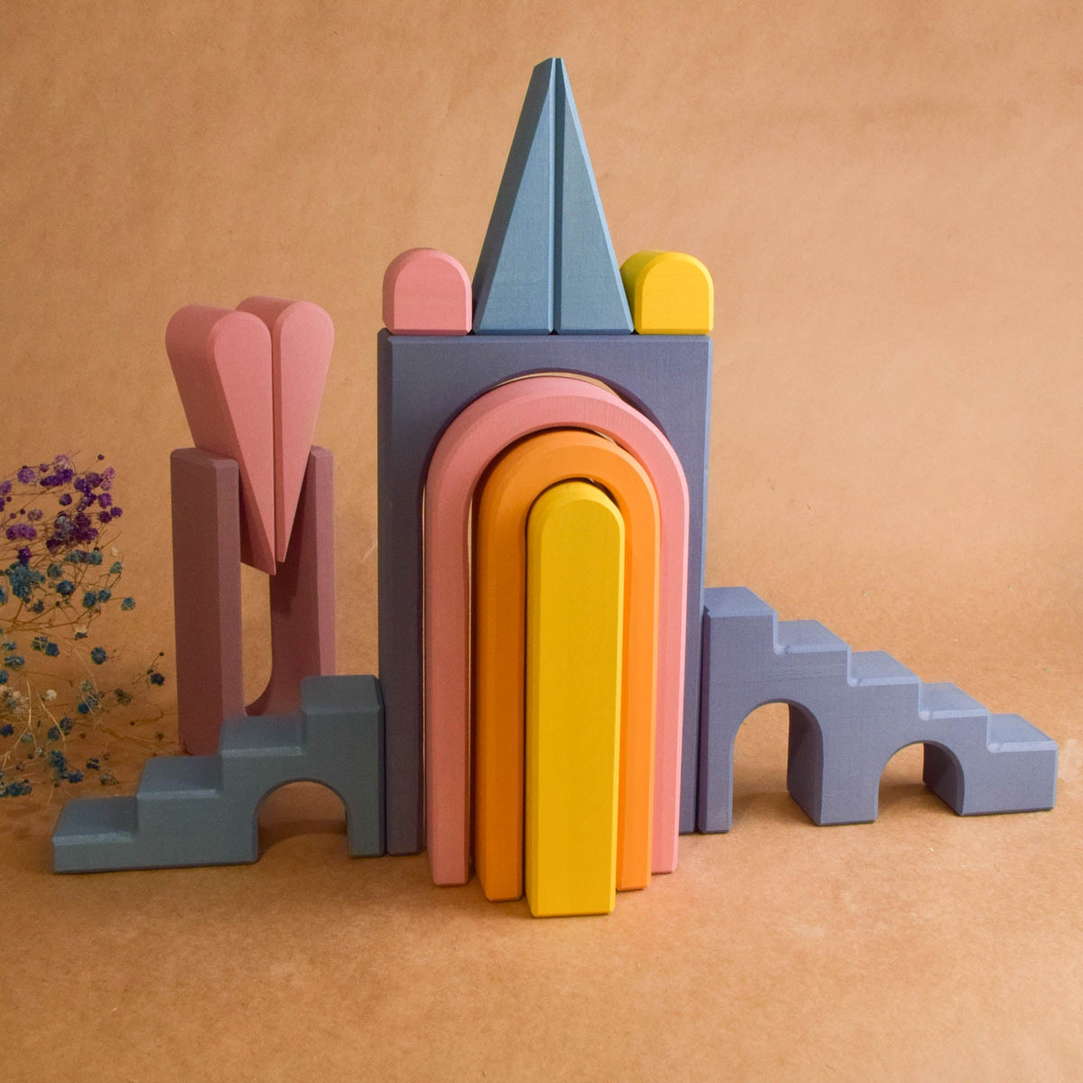 Pastel City Building Set featuring pastel-colored city-building wooden pieces for stacking, arranging, and building.