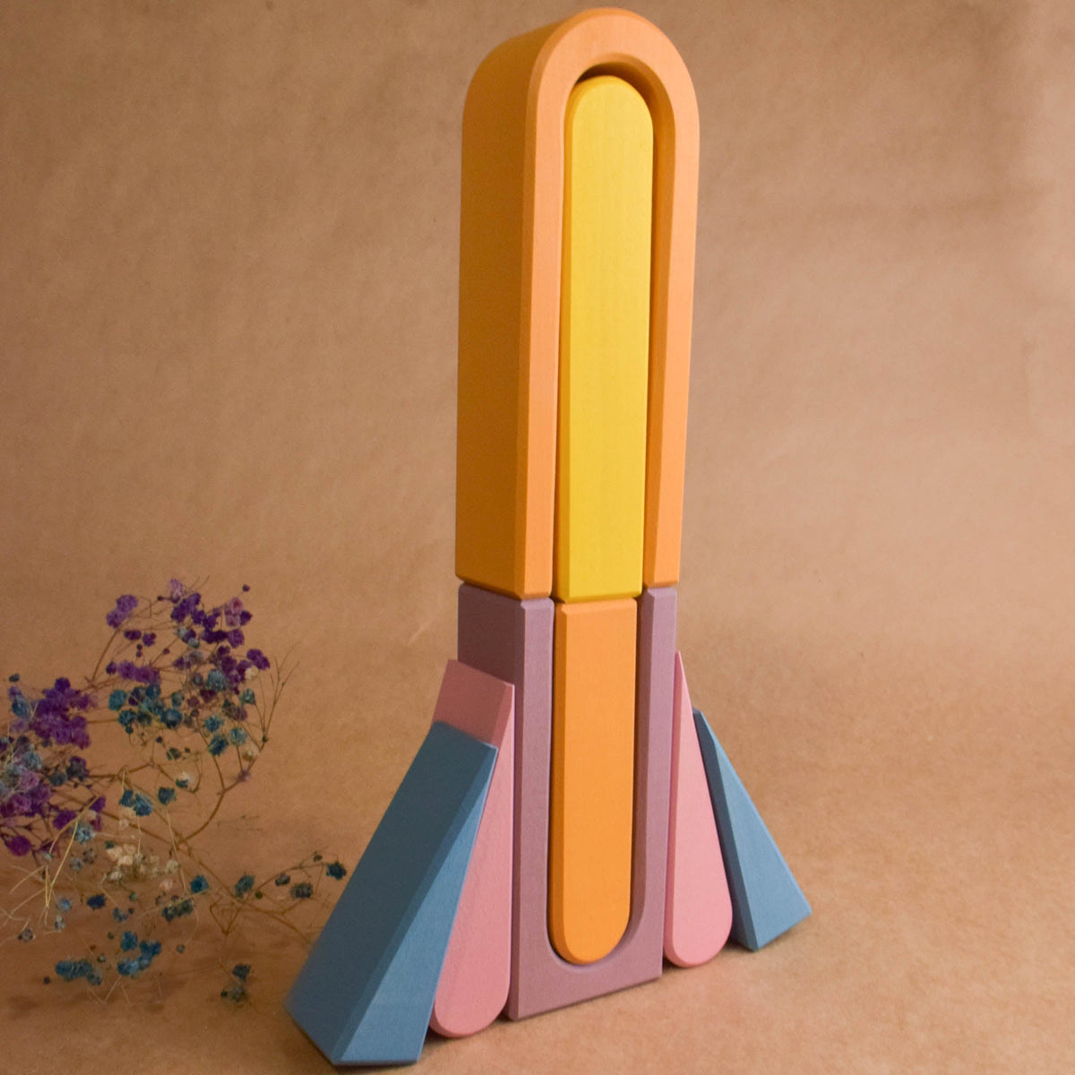 Pastel City Building Set set with pastel-colored city-building wooden elements for hands-on construction play.