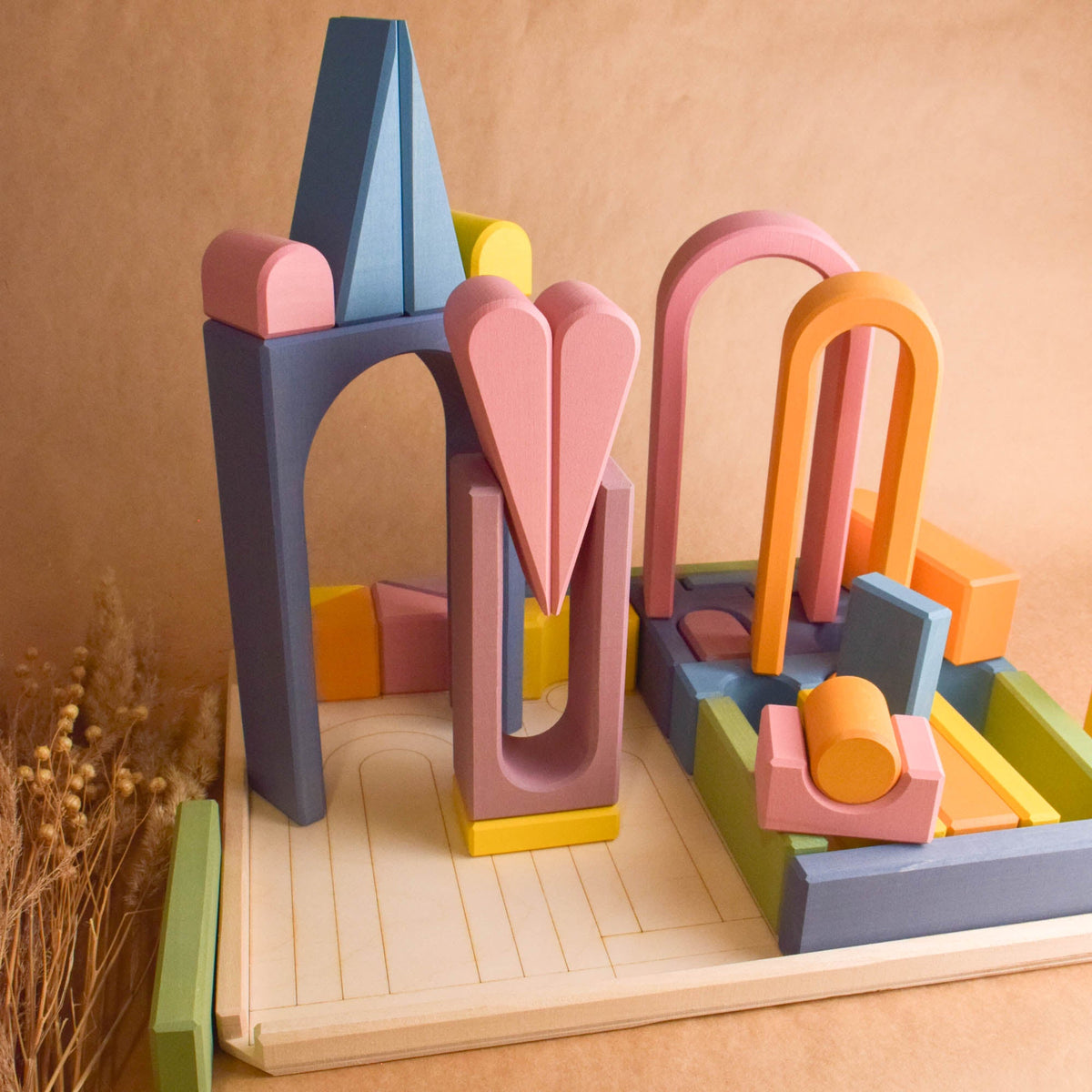 Pastel City Building Set wooden toy shown for open-ended building and imaginative play.