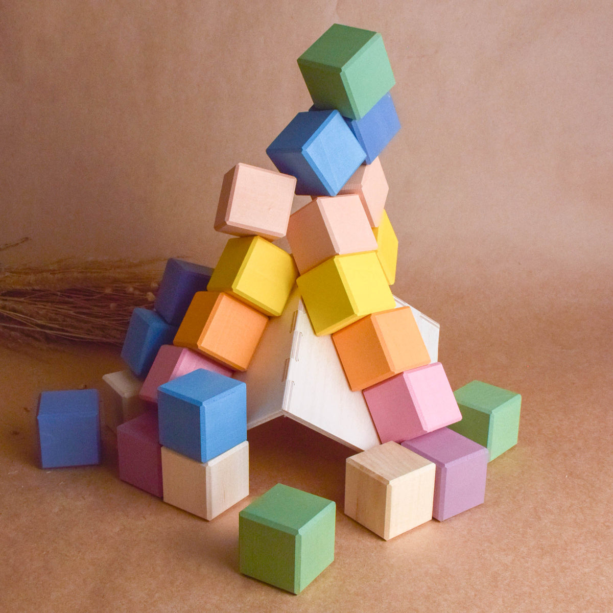 Pastel Cubes in Cube wooden toy shown for open-ended building and imaginative play.