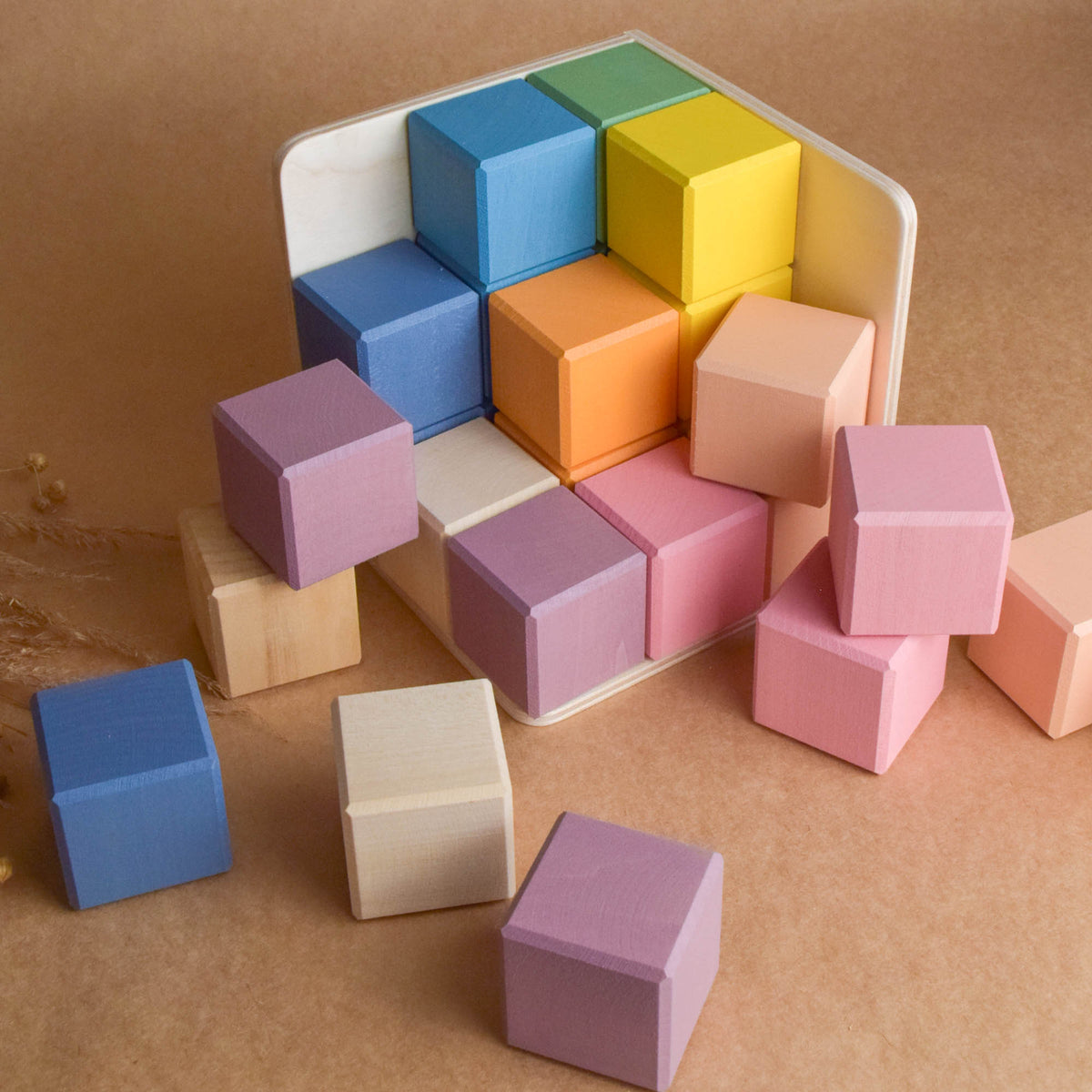 Product photo of Pastel Cubes in Cube, a pastel-colored counting wooden wooden rainbow stacker set.