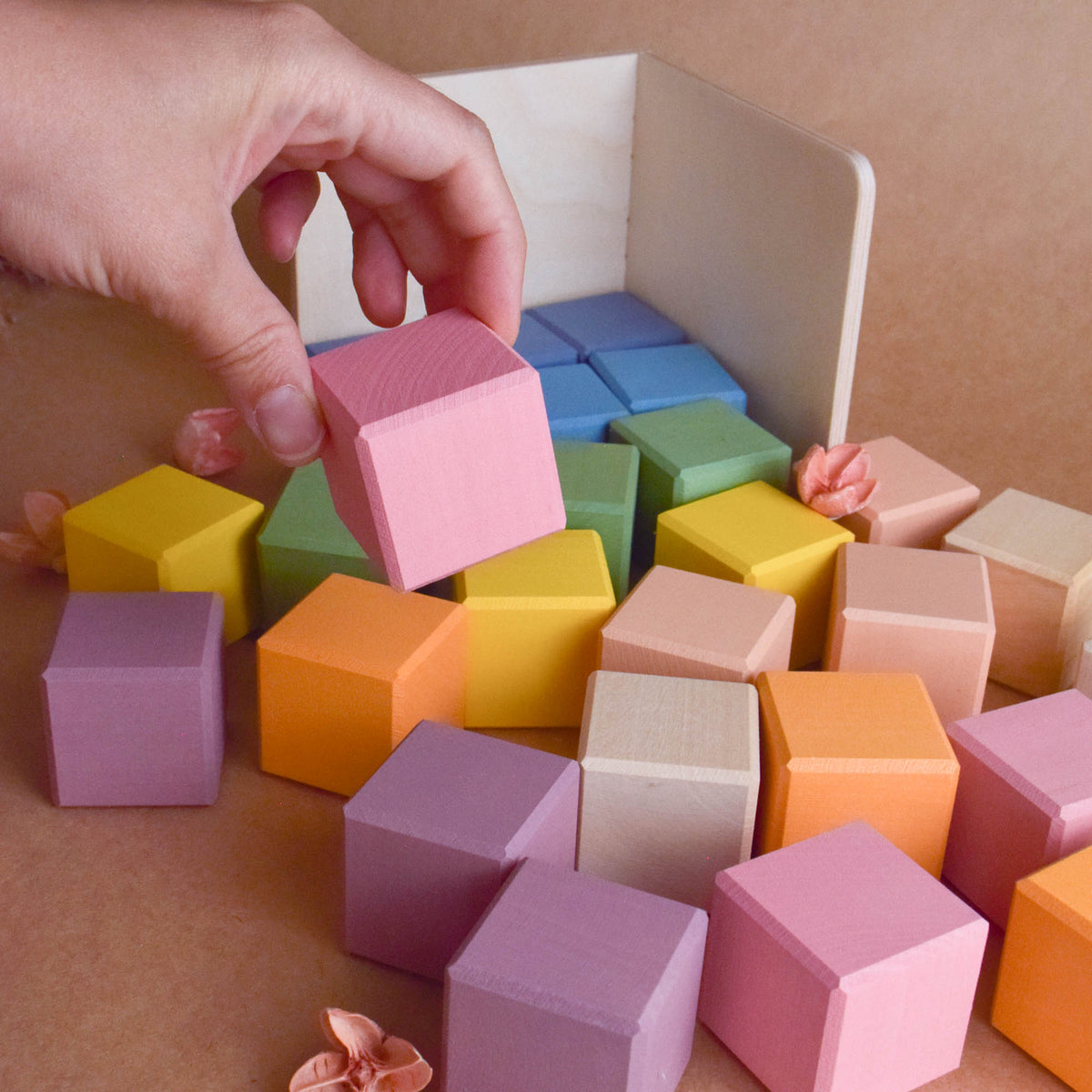 Pastel Cubes in Cube set with pastel-colored counting wooden elements for hands-on construction play.
