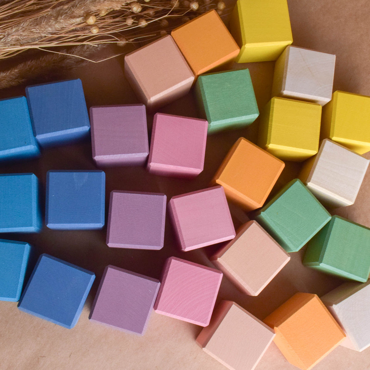 Pastel Cubes in Cube wooden toy shown for open-ended building and imaginative play.