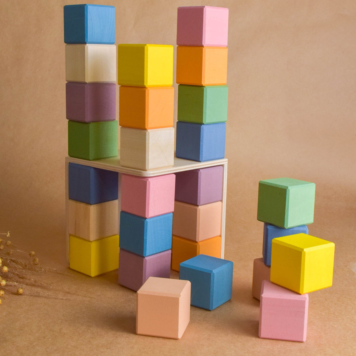 Pastel Cubes in Cube featuring pastel-colored counting wooden pieces for stacking, arranging, and building.