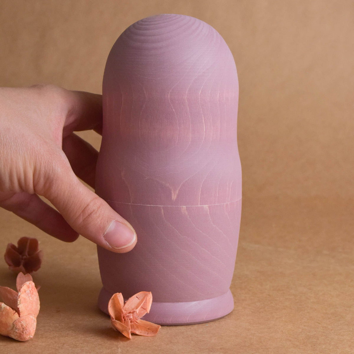 Pastel wooden matryoshka nesting dolls