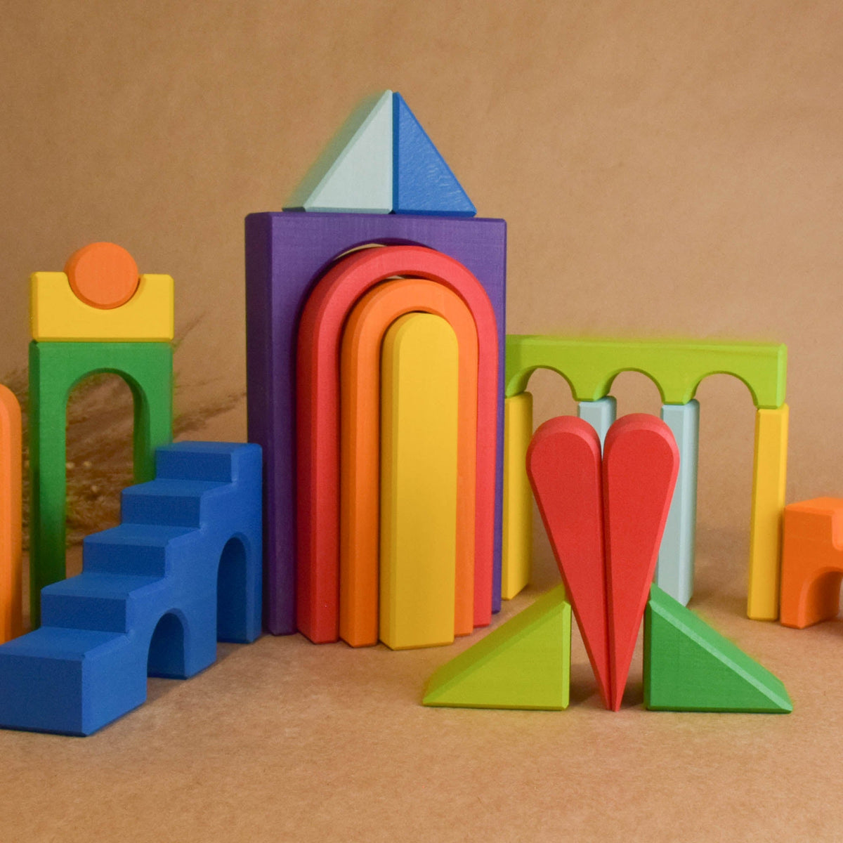 Rainbow City Building Set featuring colorful city-building wooden pieces for stacking, arranging, and building.