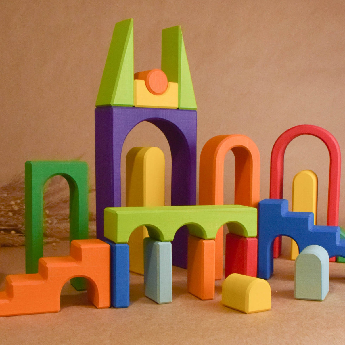 Rainbow City Building Set set with colorful city-building wooden elements for hands-on construction play.