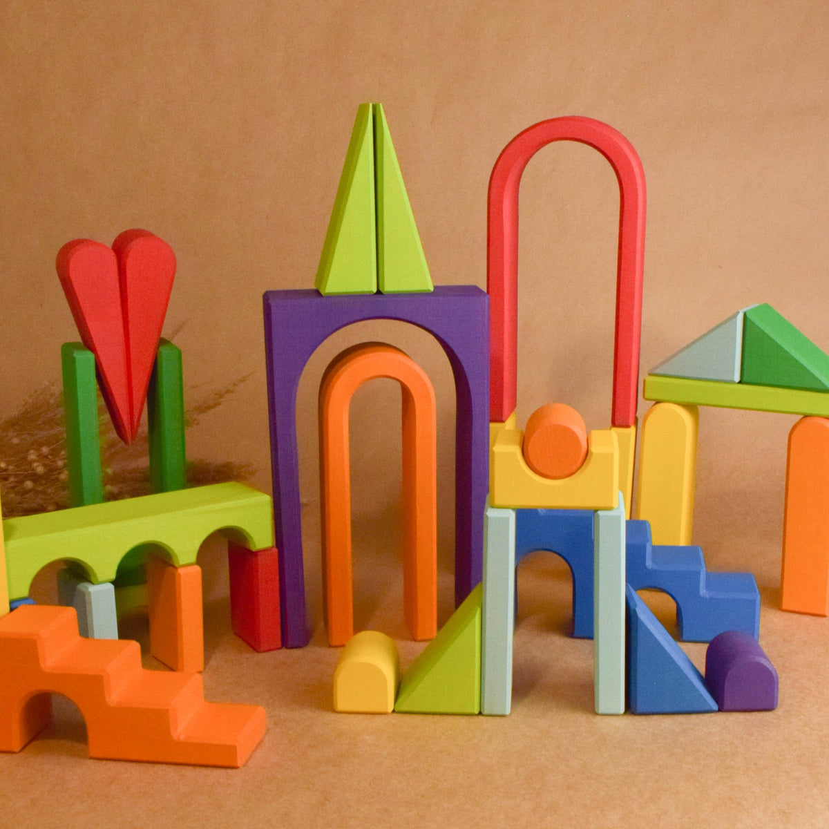 Rainbow City Building Set wooden toy shown for open-ended building and imaginative play.