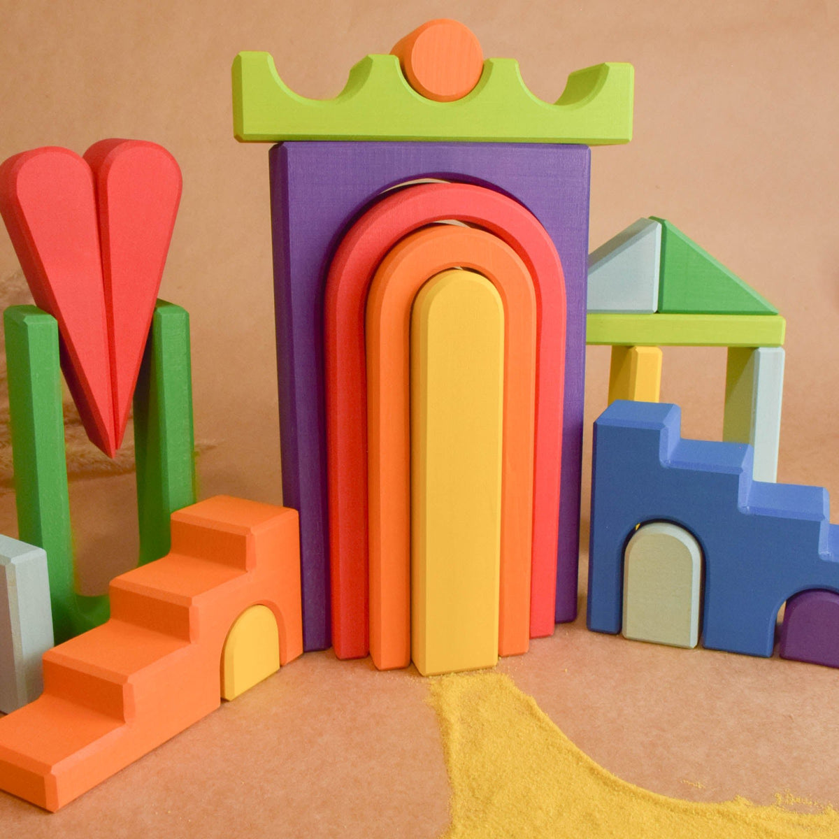 Wooden wooden rainbow stacker from the Rainbow City Building Set collection, shown in a product view.