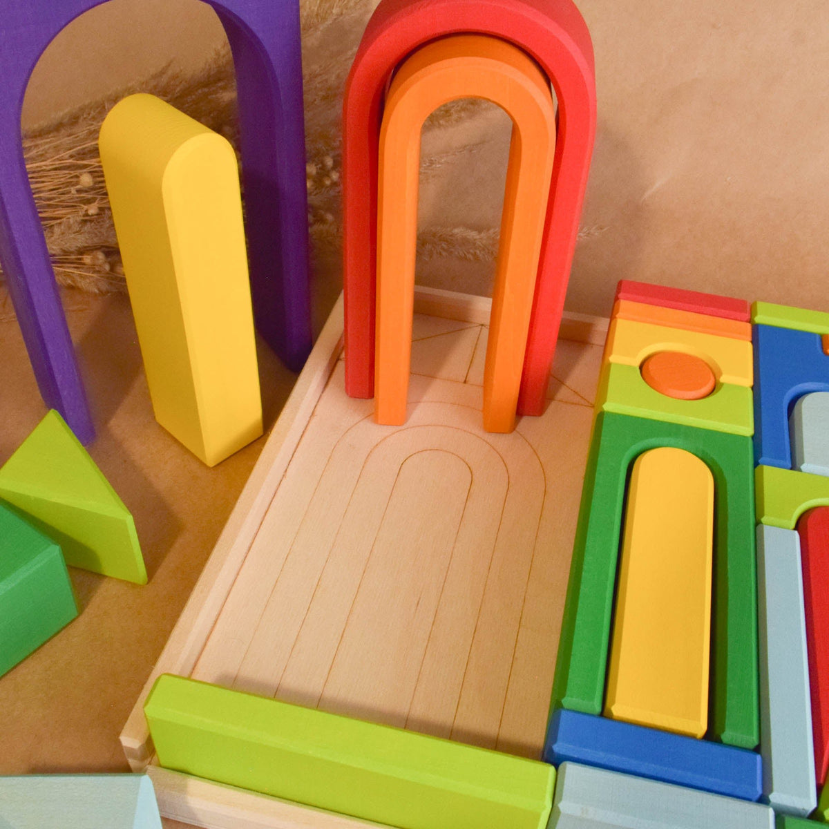 Product photo of Rainbow City Building Set, a colorful city-building wooden wooden rainbow stacker set.
