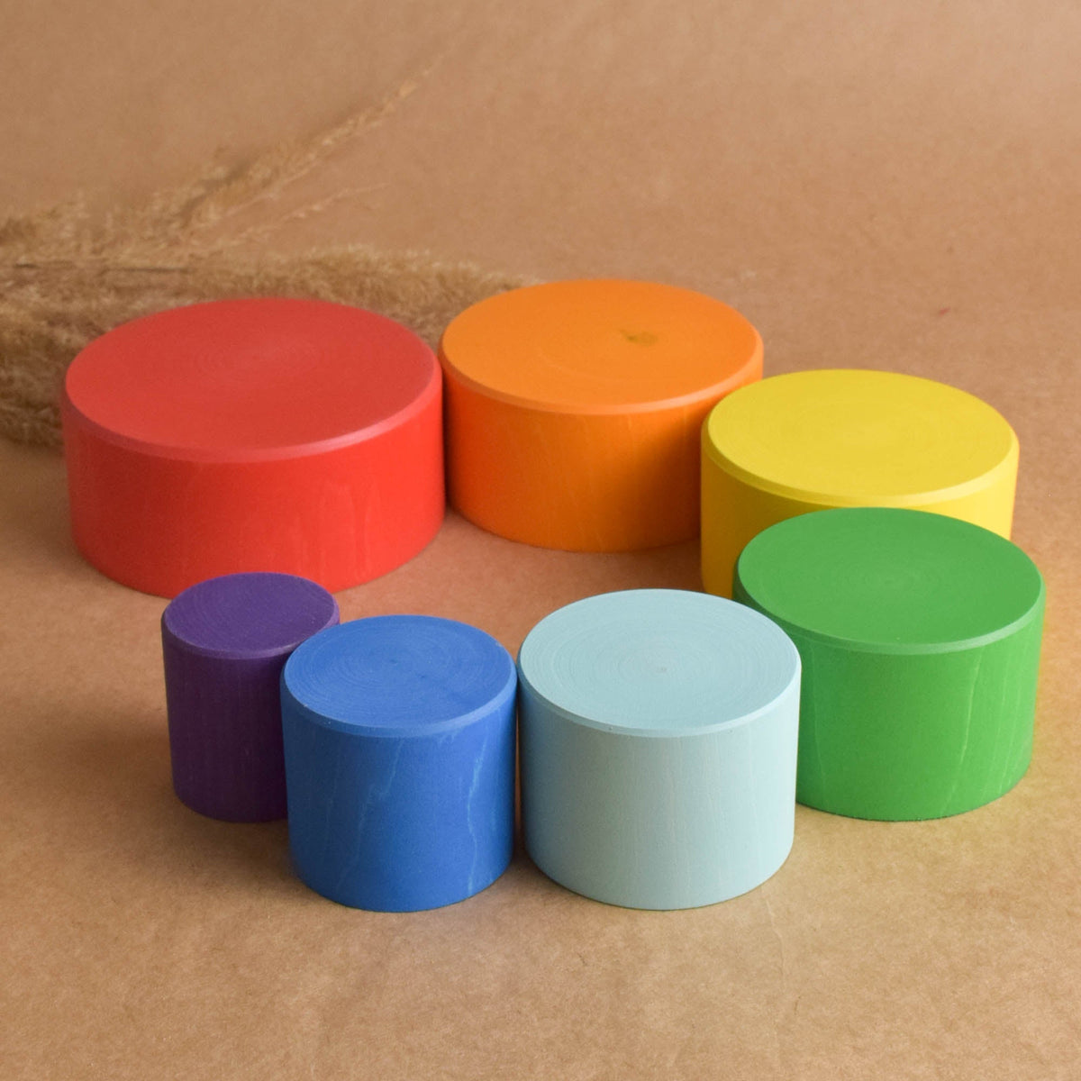 Wooden nesting bowls in rainbow colors